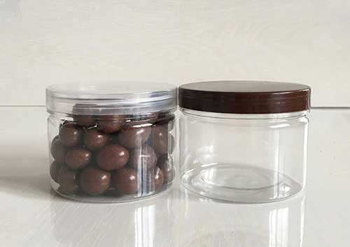 Round clear plastic storage jars with screw lids for kitchen