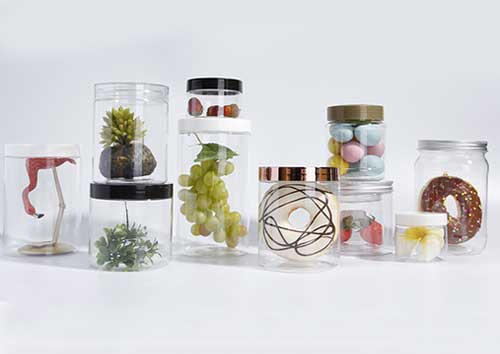 Round clear plastic storage jars with screw lids for kitchen