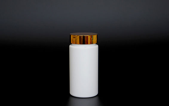 Clear plastic cylinder tablet pill bottles with gold caps from pharmaceutical bottle manufacturers